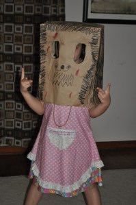 That's Maddie under the paper-sack mask!