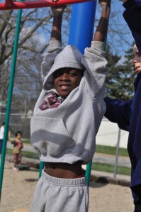 Here's a pic of PJ I took a couple weeks ago--he's hanging on monkey bars--how appropriate. I'll post a pic of him with his cast when we get the permanent one on. Each of the siblings is lobbying for a different color! We'll see.)
