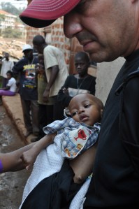 This little girl was put in Dave's arms in the slums. 
