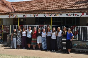 The girls (minus one--still inside with a child) in front of Springs of Hope