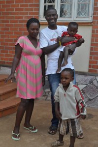 Wilfred Rugumba, the vibrant young director of Mercy Childcare, with his wonderful wife, Vena, and their two sons. They're still rescuing! 