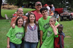 My kids with cousin Michael and Uncle Dan (back left) and one of their friends just after the five kids went zip-lining.